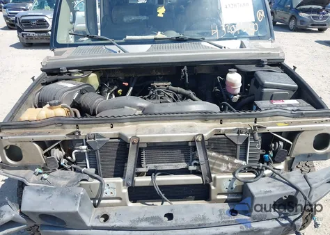 2004 Hummer H2 z USA, uszkodzony, nr VIN 5GRGN23U44H108265